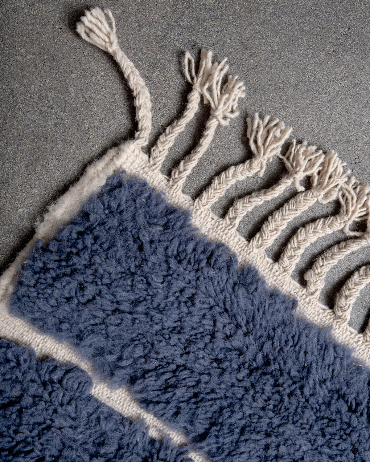 Modern, designer, handcrafted Berber rug from Morocco. Beniourain carpet with beautiful colours and patterns and fluffy wool texture.